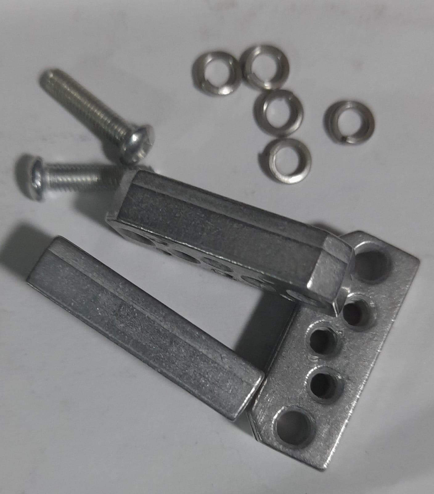 TOPE PARA PORTIPOS 3 Y 4MM ( PAR - CON TORNILLOS Y ARANDELA) - Imagen 1